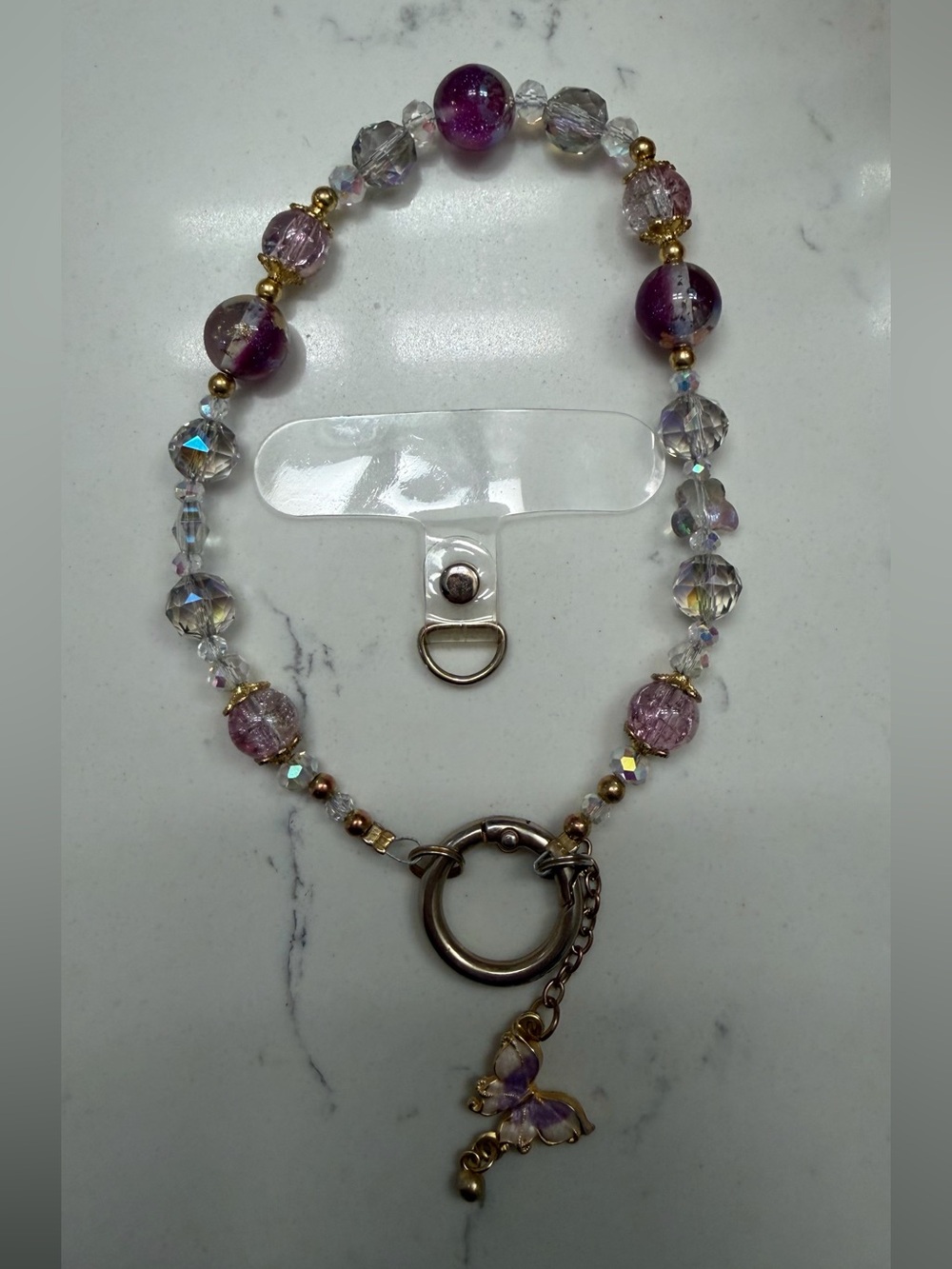 Purple and Clear Beaded Phone Wristlet with Butterfly Charm